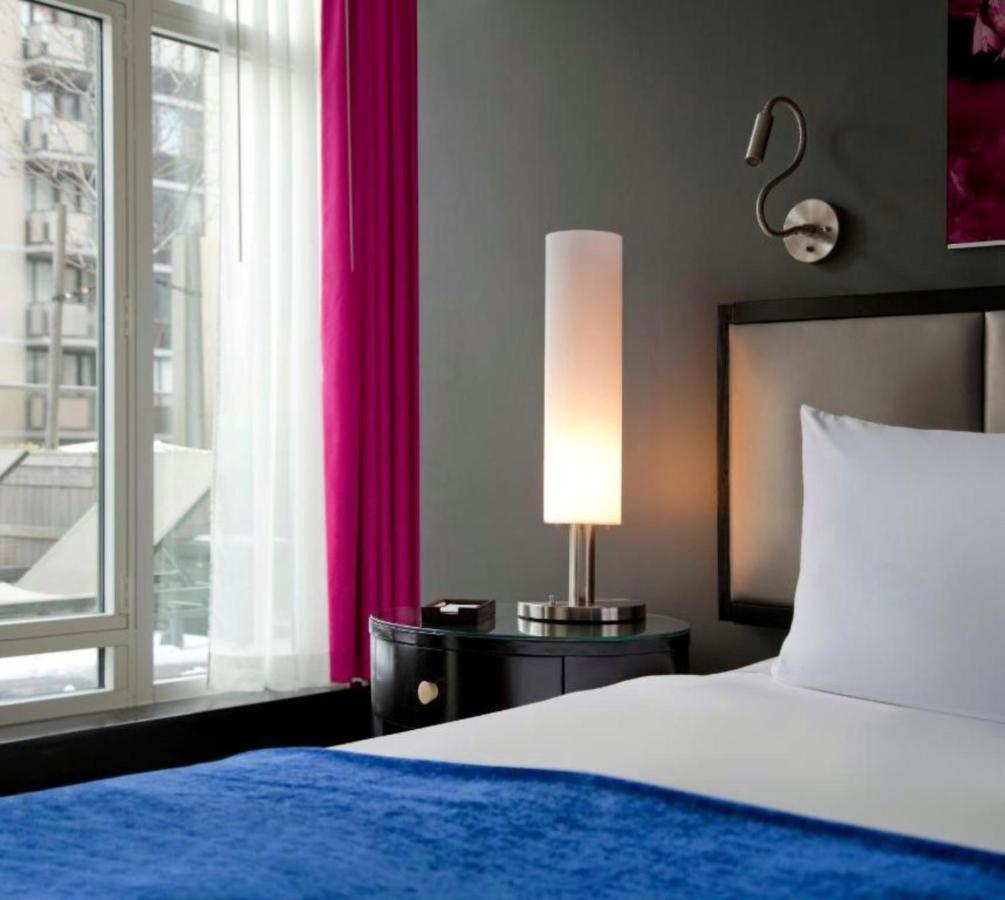 Hotel Royalton Park Avenue New York Esterno foto A bedroom at the Hotel Indigo
